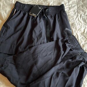 Men or boys Puma performance joggers Size small .